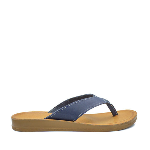 A navy-colored Angelsoft Jenna sandal with a leather foot bed and a flexible PU sole, designed for comfort.