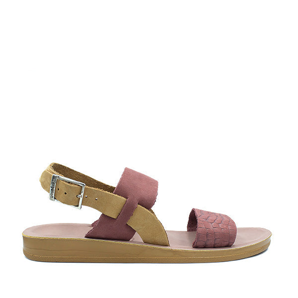 A plum-colored Angelsoft Tanya sandal with a light brown PU sole and genuine leather uppers, featuring a buckle strap and a flat heel.