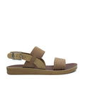 A tan-colored sandal with a buckle strap and a flat sole, made with genuine leather uppers and a polyurethane flex sole.
