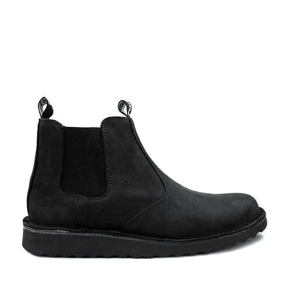 A black leather Grasshoppers Tyson Chelsea boot with pull tabs and a low heel, designed for casual wear.