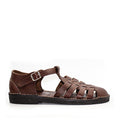A brown leather closed-toe sandal with a fisherman silhouette, featuring an adjustable buckle closure.