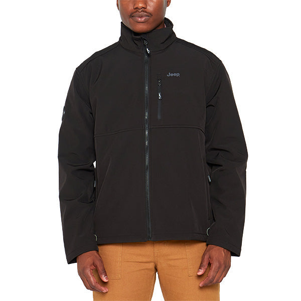 Black jacket with Jeep logo worn by a person on a white background