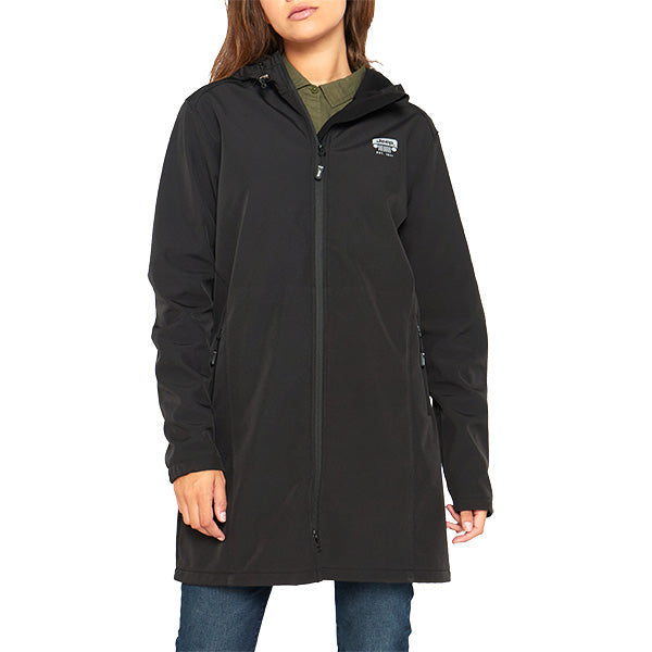 A woman modeling a black Jeep ladies longer length soft shell jacket with side-entry pockets and a sleeve pocket, featuring a reflective print on the left chest.