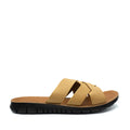 Tan sandal with black sole on a white background, featuring Vellie Boutique logo.