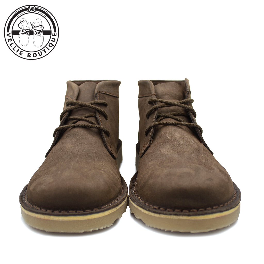 A pair of authentic South African veldskoen leather shoes with lightweight flat TR soles.