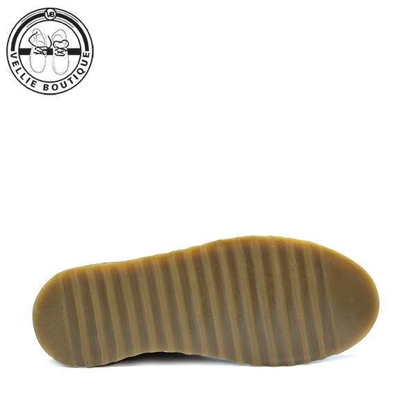 Underneath view of the durable, lightweight Thermo Rubber TR flat sole on KapoQ Vellies