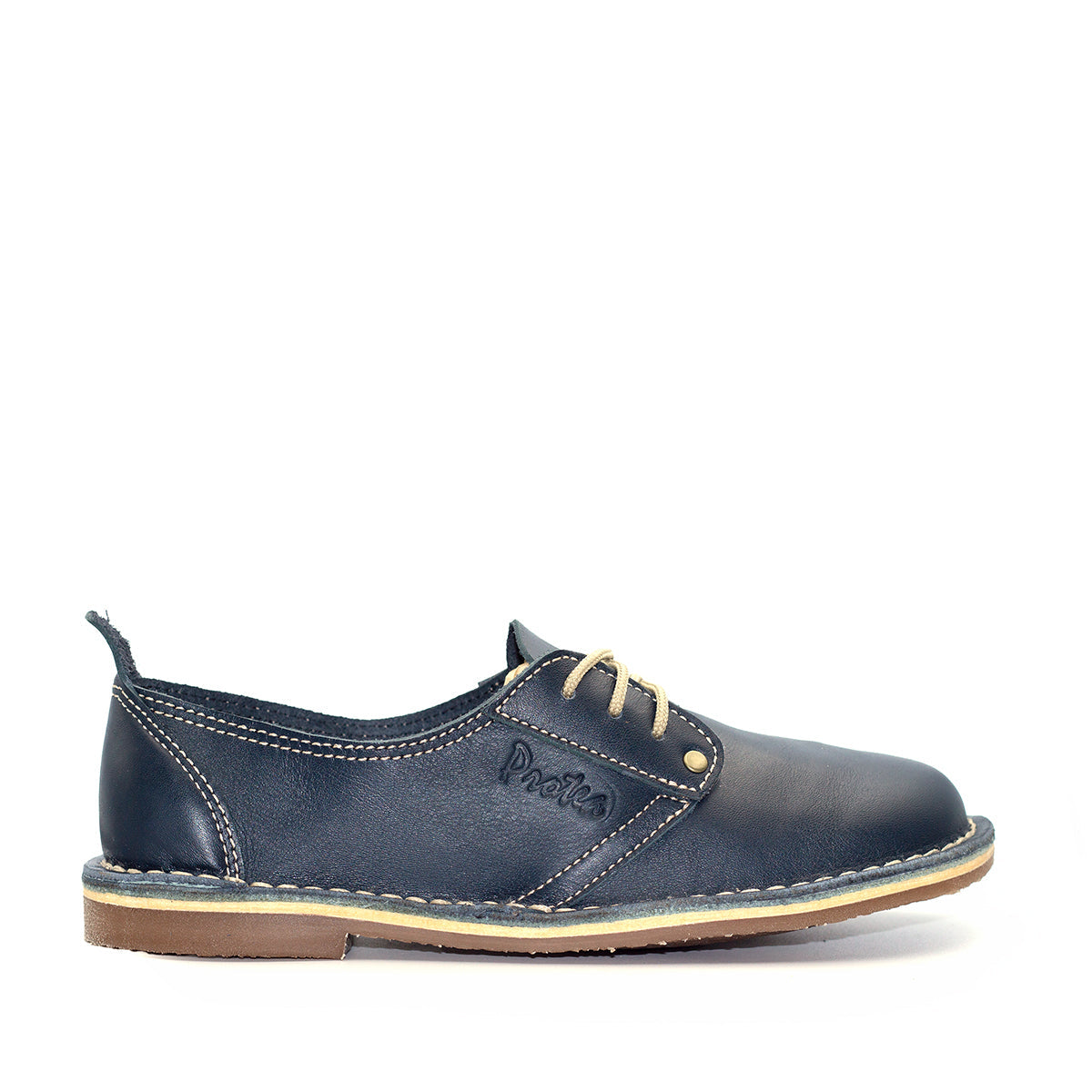 A Navy colored Protea Vellie shoe with a low heel and lace-up front, handcrafted from premium leather. Handmade in South Africa