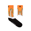 Socks with cartoon ostrich design on an orange background, brand 'Vellie Boutique' visible.