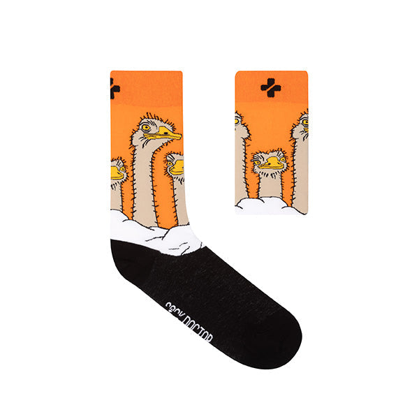 Socks with cartoon ostrich design on an orange background, brand 'Vellie Boutique' visible.