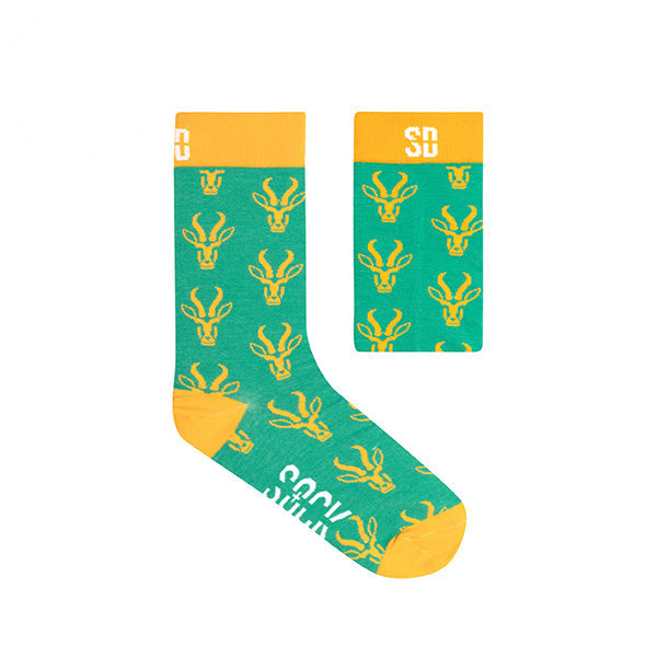 Green socks with yellow accents and deer head pattern on a white background, featuring a brand logo.