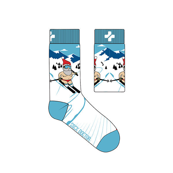 A pair of Sock Doctor branded socks with a Christmas-themed design featuring Santa Claus on a snowy mountain background.