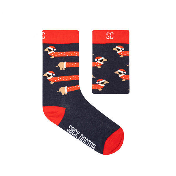 A pair of navy blue socks with a Christmas themed design.