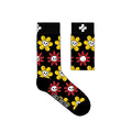 A pair of socks with a skull and flower pattern, predominantly black with red and yellow accents, and the brand logo 'Sock Doctor' visible.