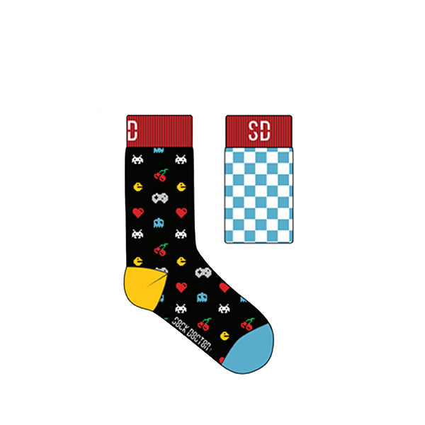 Two pairs of children's socks with arcade game designs, one pair with a red and blue color scheme and the other with a black and white color scheme.