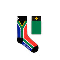 A pair of children's socks with a geometric pattern in South African flag colors