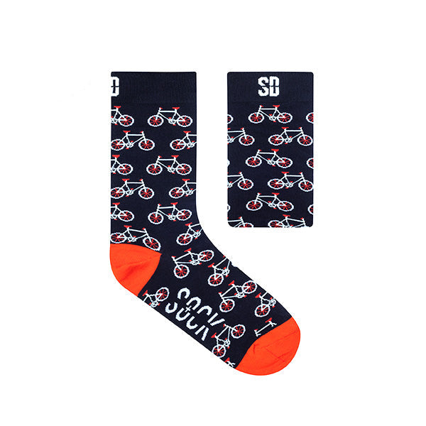 A pair of socks with a pattern of bicycles and the brand name 'SOX DOCTOR' featured prominently in orange on the ankle area.