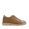 A women's Suikerbossie vellie shoe with a tan color and leopard print pattern on the toe cap, featuring a lace-up closure.