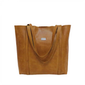A toffee-colored, full-grain leather handbag with two shoulder straps and a magnetic clip closure.