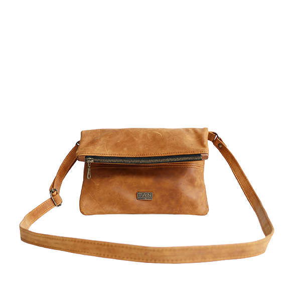 A toffee brown leather sling bag with a cross-body strap and a zippered closure.