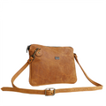 A toffee brown leather sling bag with a zipper closure, a detachable strap, and a visible brand logo.