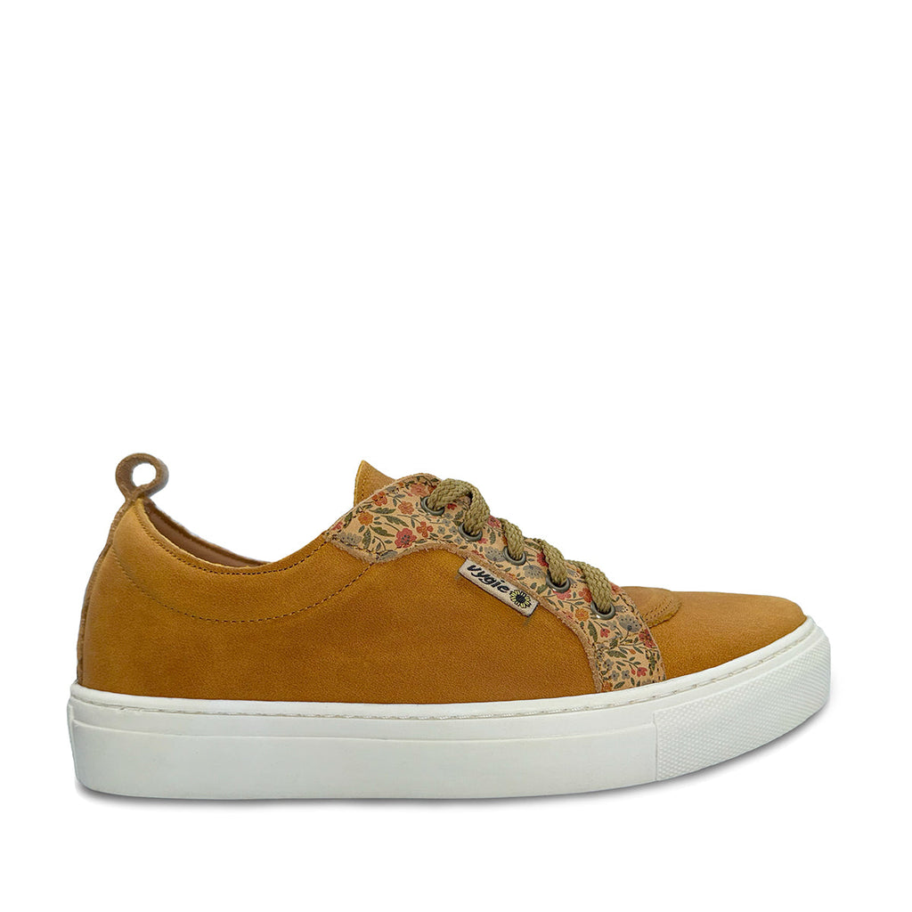 Brown sneaker with floral pattern on a white background.