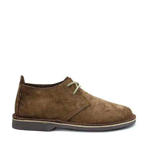 A brown handcrafted leather shoe, known as a Vellie, with a lace-up closure and a low heel.