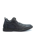 A black handcrafted leather shoe with lace-up closure, featuring stitching details and a small brand logo on the heel.