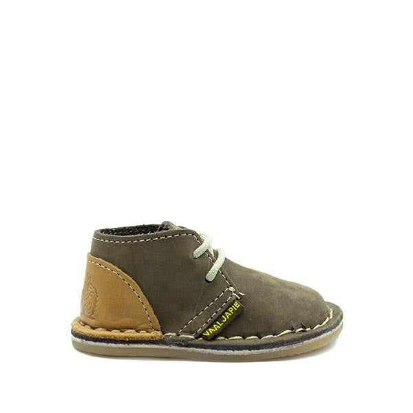 A child's brown and beige leather shoe with a lace-up closure and a round toe style.