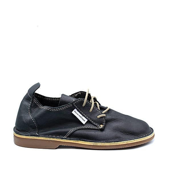 A pair of Oukraal low-cut vellies in black color with lace-up closure, made from soft leather.