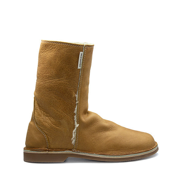 A brown Oukraal SNUGG boot with a zipper on the side.