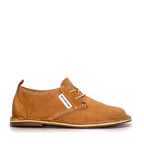 A brown leather women's vellie shoe with a low heel and lace-up closure. Handmade in South Africa