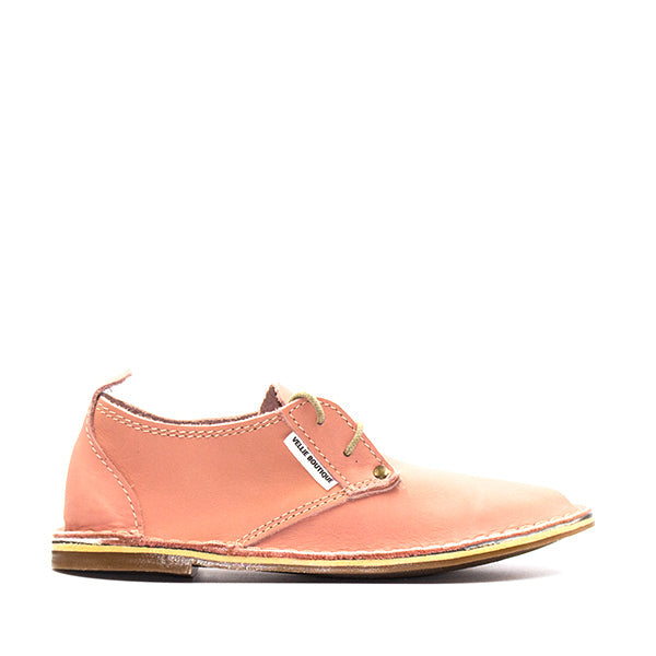 A pink leather women's vellie shoe with lace-up closure, designed by Vellie Boutique.
