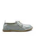 A silver Protea Vellie shoe with a low heel and lace-up closure, handmade in South Africa.