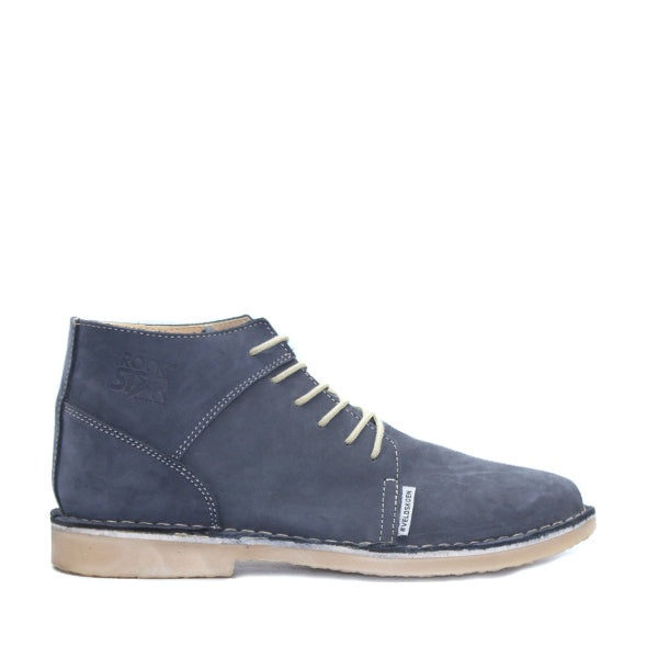 A navy blue Rockstar Vellie, a type of South African shoe, featuring a lace-up closure and a low heel.