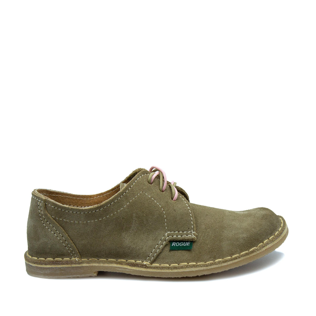 A fawn-colored suede leather shoe with light-colored stitching and pink laces.